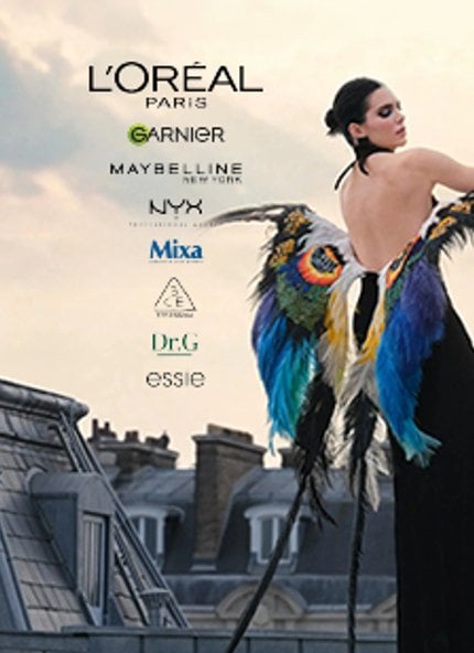 2026consumerdivisionbrandskendallinblackbacklessdresswithfeathersclimbingstairsbannermobile