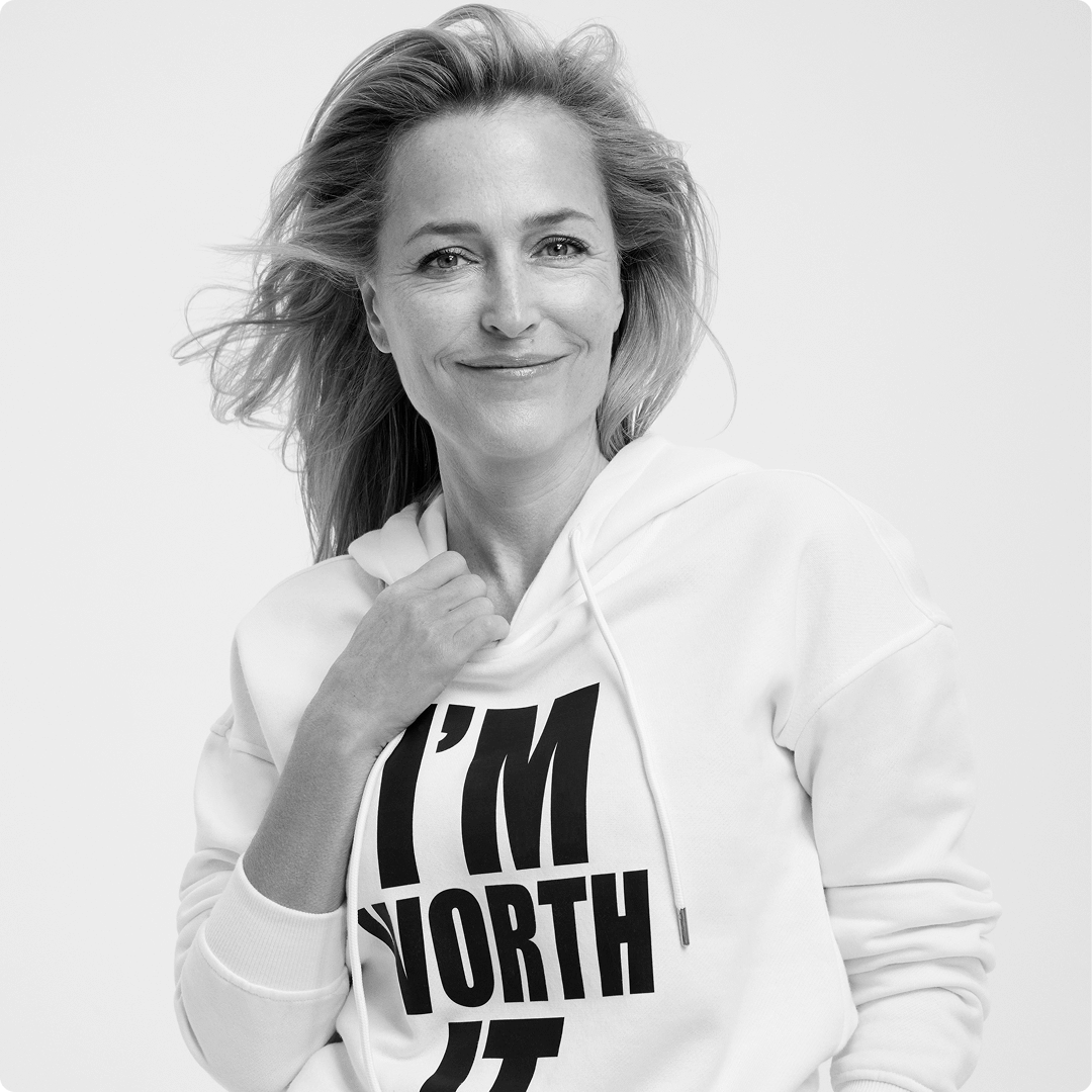 2025 loreal consumer products division brand woman wearing a i am worth it hoodie with blonde hair