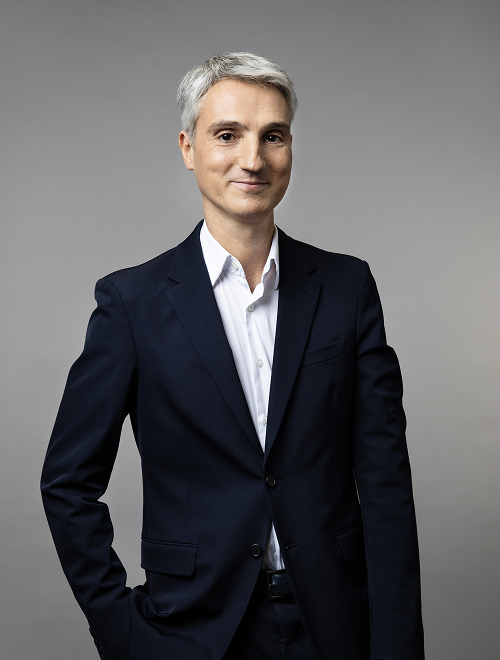 2025 prada luxe brand president men in blue suit white hair