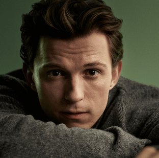 2026 luxe division tom holland in grey sweater hero banner mobile