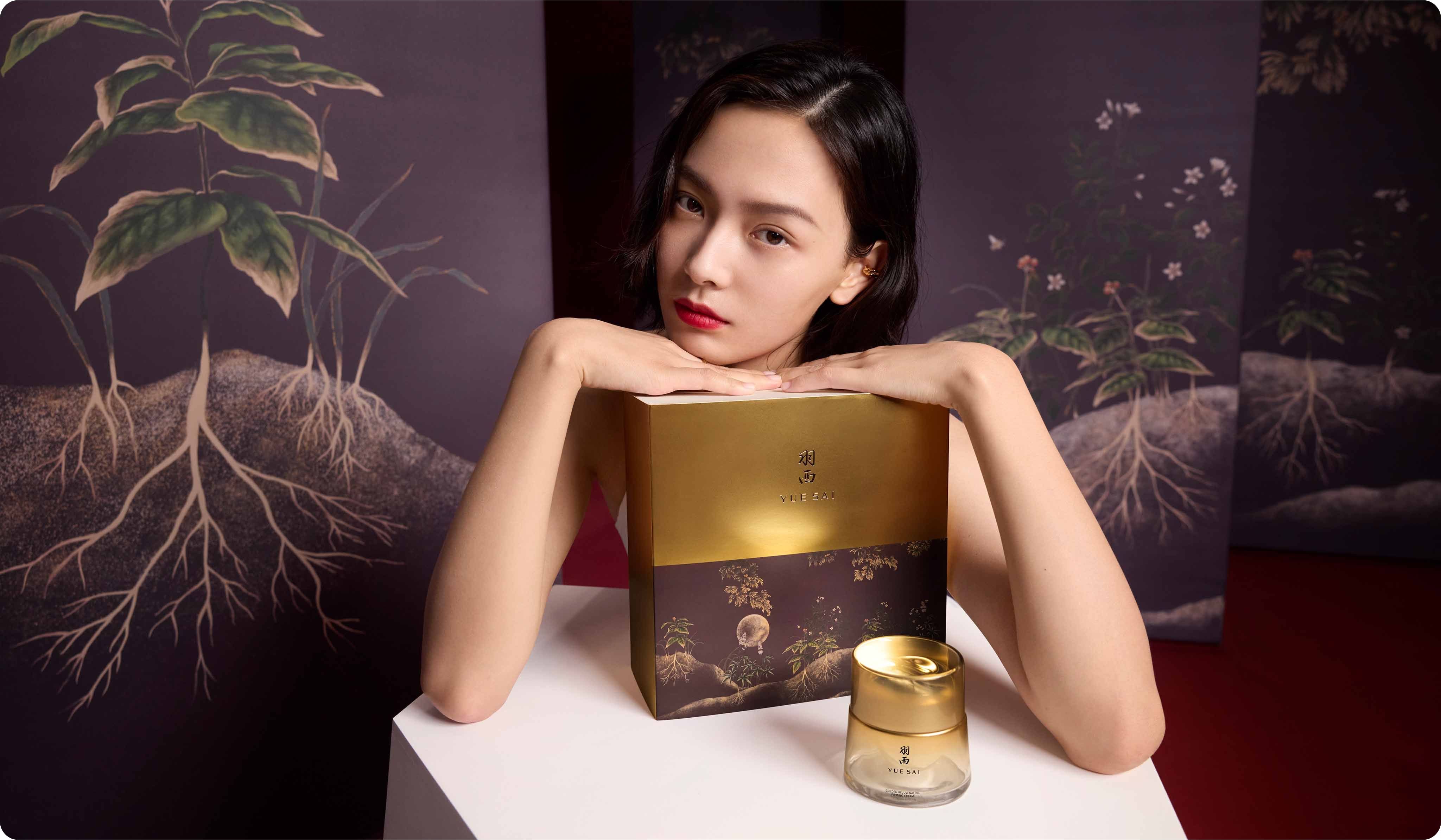 2026 loreal luxe brand yuesai woman with short black hair and red lipstick holding yuesai box
