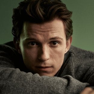 2026 luxe division tom holland in grey sweater hero banner mobile