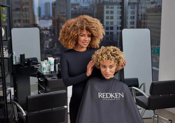 2026 professional products division women with brown curly hair styling