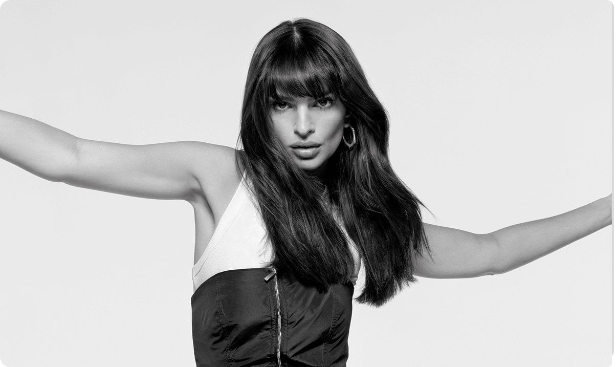 2025 kerastase loreal professional product woman with bangs hairstyle in white and balck top posing